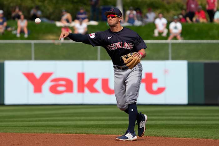 Mar 6, 2023; Tempe, Arizona, USA; Cleveland Guardians second baseman Tyler Freeman (2) makes the play for an out against the Los Angeles Angels in the first inning at Tempe Diablo Stadium. Mandatory Credit: Rick Scuteri-USA TODAY Sports